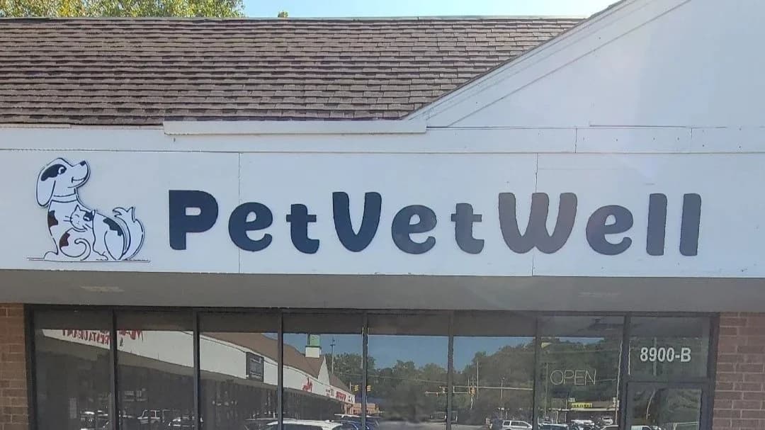 PetVetWELL storefront at 8900 Mentor Ave, Suite B, Mentor, OH 44060. Look for the dog-and-cat sign